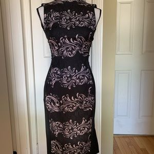 Shin length form fitting dress